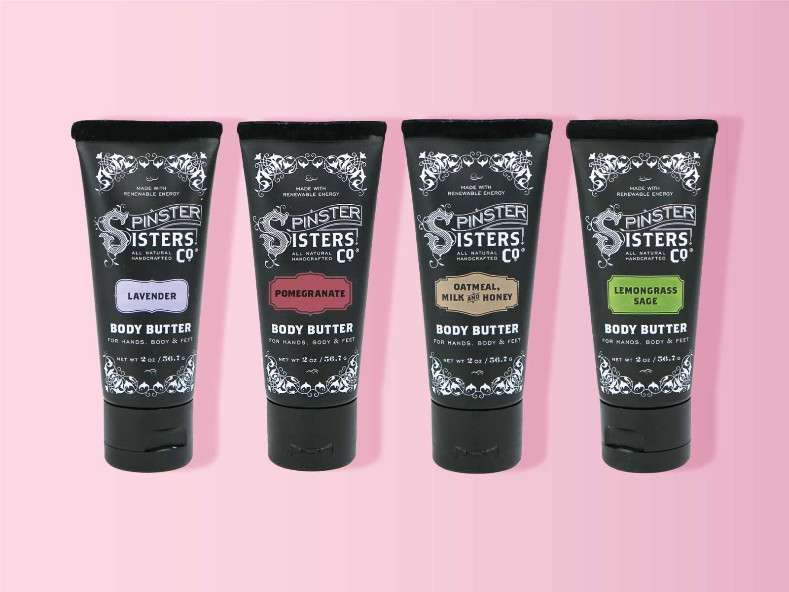 Four black lotion tubes in Lavender, Pomegranate, Oatmeal Milk and Honey, and Lemongrass Sage